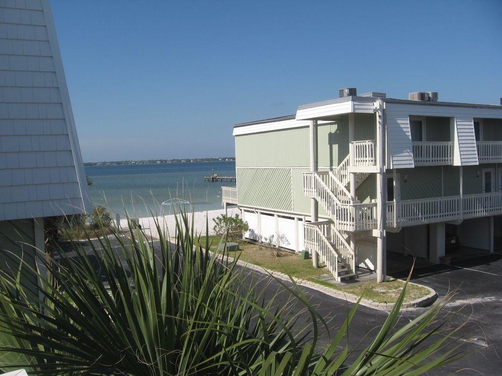 Island's End vacation rental is the best of both worlds because it is ideally located in the Pensacola Beach Boardwalk sound side community with 600 feet of one of the Island's largest and most