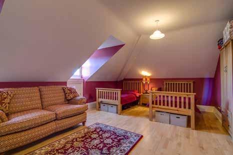 Solid circular wooden stairwell leading to... SECOND FLOOR LANDING: Excellent open reading area. Attractive roof lantern. WC: Low flush WC. OPEN STUDY/KIDS AREA: 19 3 x 9 3 (5.87m x 2.