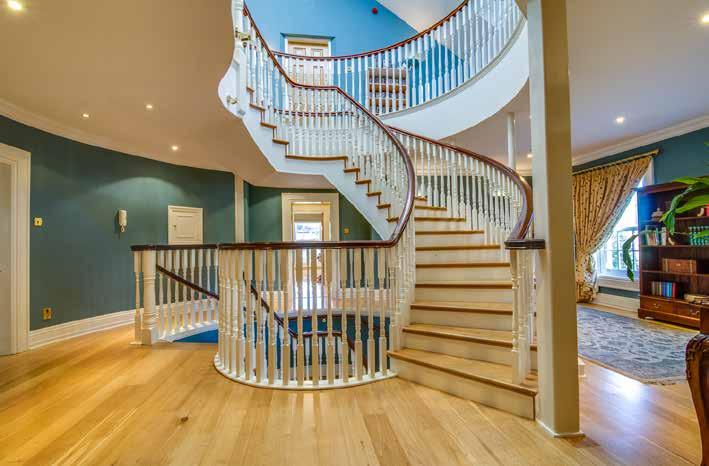 Feature hand built solid wooden circular stairwell leading to... FIRST FLOOR LANDING: Solid wooden floor. Corniced ceiling. Low voltage lighting. Laundry chute accessing Utility Room.