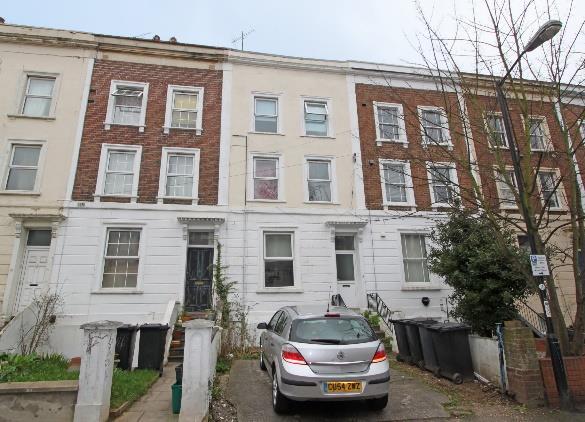 semi-detached Victorian property currently arranged as 8 selfcontained flats (6 studio flats and 2 one bedroom flats) with an additional single storey dwelling to the rear.