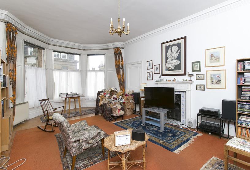 The elegant drawing room is situated to the front of the property and has a beautiful corner bay window with views extending towards the west of Edinburgh.