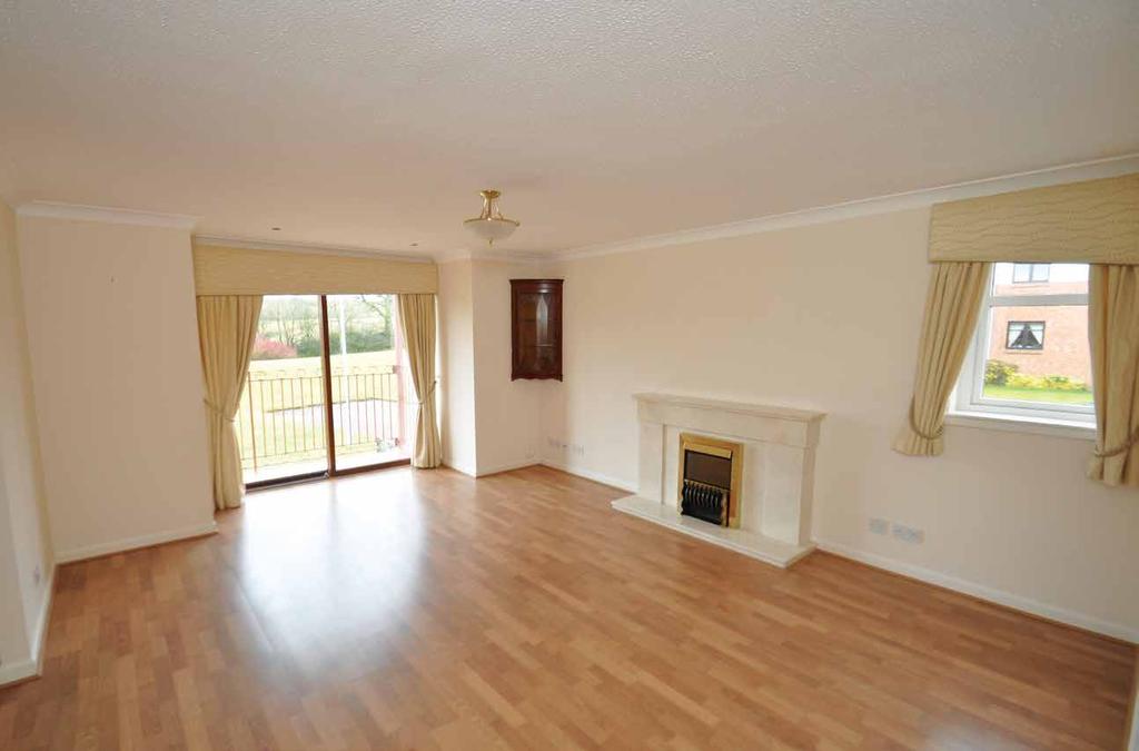 An exceptional ground floor flat with private south facing balcony and garage.