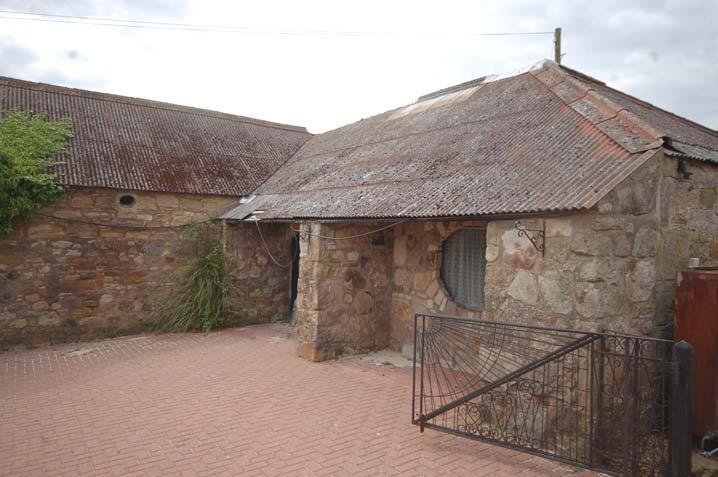 There is scope to convert the steading block with another house subject to planning consent. Paddock and Adjacent Equestrian Centre There is a 1.