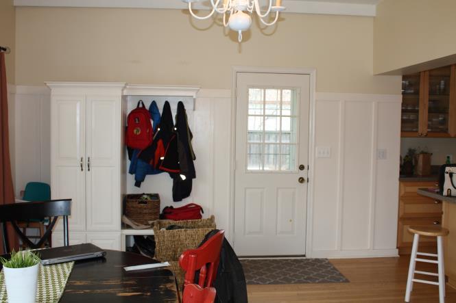 This mudroom has several different types of closed and open