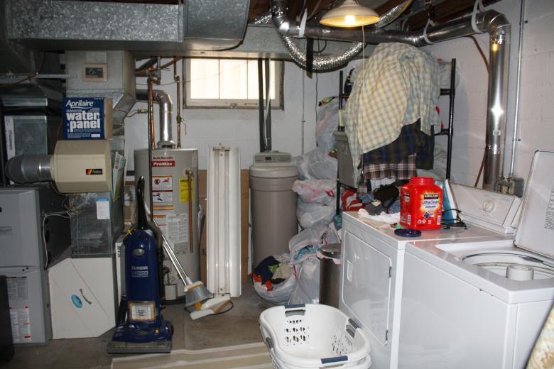 Laundry Room Before Originally located in the basement, the laundry room was relocated in its own space on the 2 nd