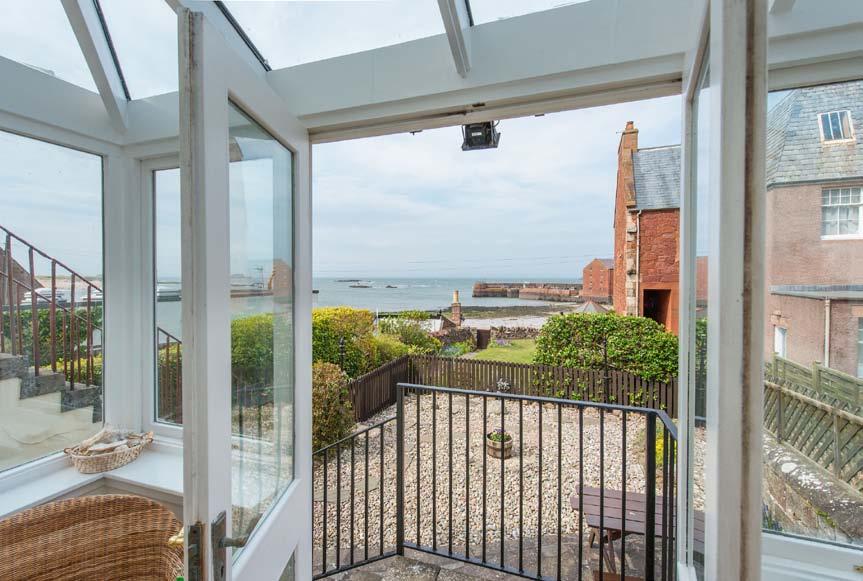 Ithaca House 14 Forth Street North Berwick, East Lothian, EH39 4HY A beach front ground floor apartment benefiting from remarkable panoramic views across West Bay against the skyline of Fife,