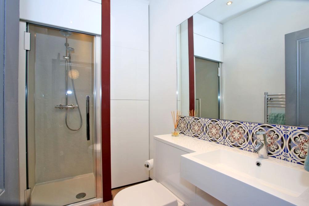 SHOWER ROOM: 7 1 x 5 approx. Centrally located, the upgraded Shower Room is fitted with a shower enclosure, w.c and wash hand basin set into vanity furniture with storage below.