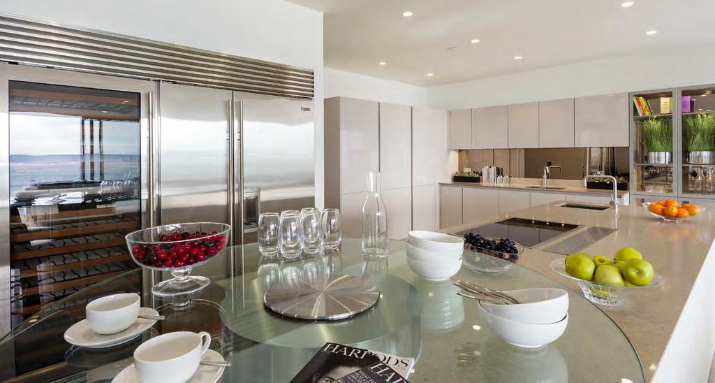 Emerging at the heart of this elegant space is the stunning social kitchen.