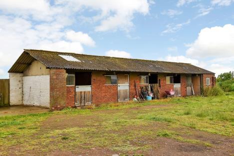 Outbuildings - The outbuilding extends to appromatley 81'31" x 17'7" and comprises; Feed Room, Feed