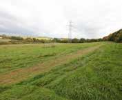 There is a footpath crossing Lot 2 of the land. There is also a power line crossing the land to the south.