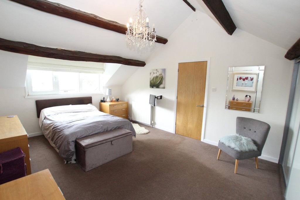 The landing provides access to two double bedrooms and bathroom.