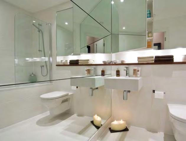 love quality bathrooms, en-suites and shower rooms contemporary, white, tiled suites with a feature lit walnut veneer