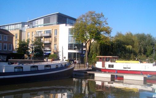 The serviced moorings have been newly developed on floating pontoons supported by steel piles and set against the banks of the locked basin which is triangular in shape.