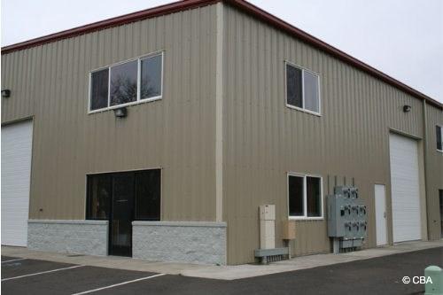 This unit has a 400 SF mezzanine that brings the total SF to 1,900+ SF, large industrial space, 2 custom offices, reception area for retail, roll up door, 2 man doors, 16+ FT clear span ceiling