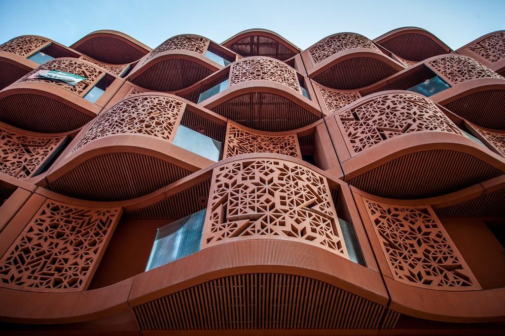 residences and laboratories are oriented to shade both the adjacent buildings and the pedestrian streets below and the facades are also self-shading Over 5,000 square