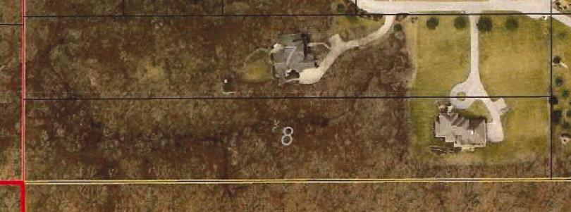 Here is an aerial view of the property: Clearly, the owner of Lot 8 enjoys a permanent, exclusive easement over the part of Lot 7 which lies east of the dotted line shown on the plat.
