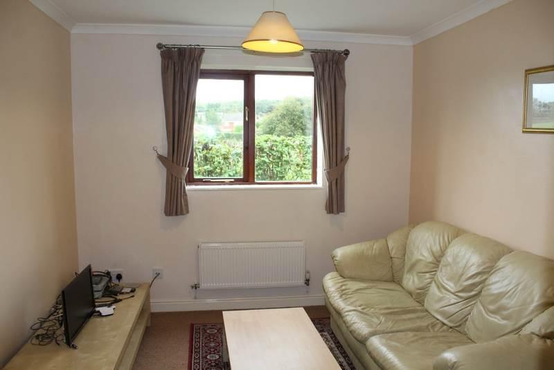 Coved ceiling, window overlooking side aspect, two television points  BATHROOM Comprising a