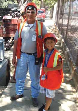 Ortega, CLSA Associate, hard at work on Father and Son Day at the City of Burbank Water and Power Yard.