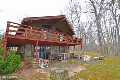 Also includes a well maintained 2 bedroom guest cottage with lake views and large deck. Total Bedrooms 6 Total Baths 4.5 Baths.