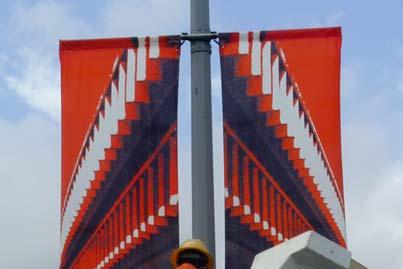 Today on the Burrard Bridge they re installing the City Banners - a public-art program that has