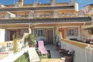 94,900 Well presented terraced house, 3 bedrooms, 2 1/2 bathrooms, separate kitchen, a/c, heating, fireplace, furn., sunny, garden, utility, solarium, com. pool, gated complex.