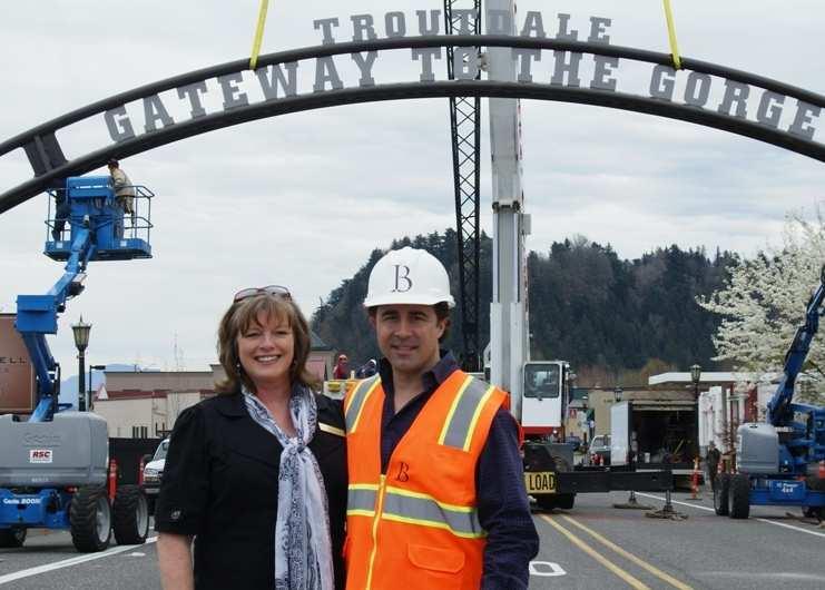 Artist Team Member Kathy Toynbee, General Manager Kathy and Rip under the Troutdale Entryway Arch General Information: Kathy Toynbee has been the primary point of contact for Rip Caswell clients and