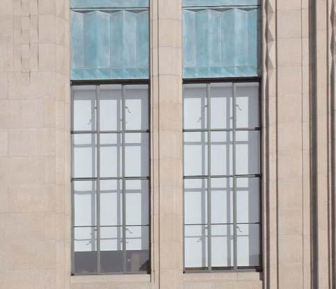 Windows shall be situated between pilasters and shall