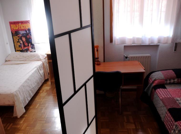 Room description: There are two bedrooms: A very large double with two closets, shelves, two