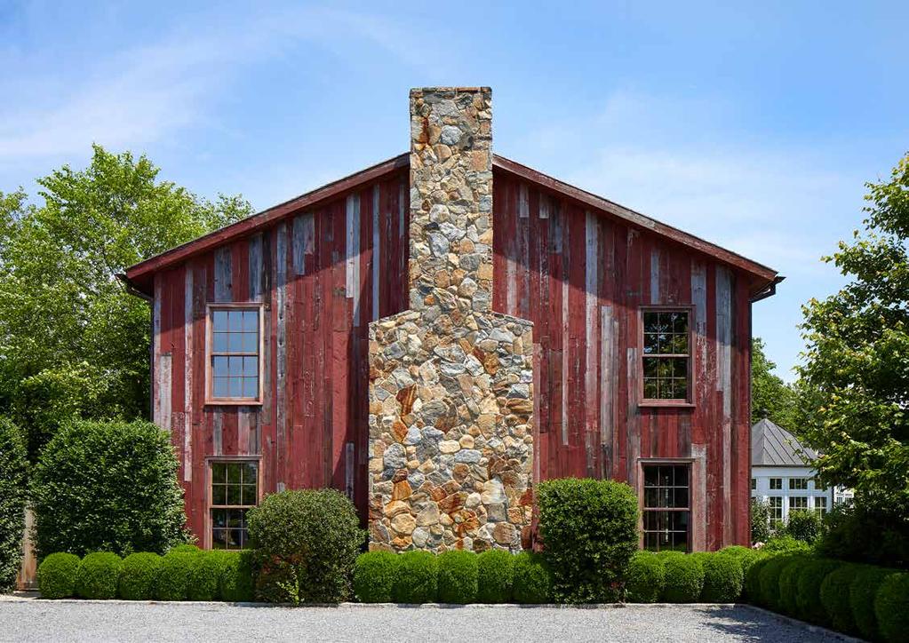 LATE 1800'S BARN MASTERFULLY REIMAGINED IN 2012 Staying true to the property's provenance, this timeless barn was recreated in 2012 with reclaimed wood from the property's original late 1800s barn,