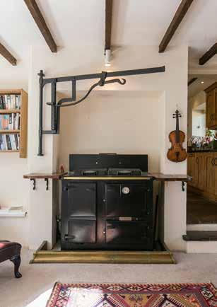 Guinness Brewery reclaimed floorboards. Inglenook Fireplace with feature Multi fuel burning stove and quarry tiled hearth. DINING ROOM: 20 2 x 14 5 (6.15m x 4.