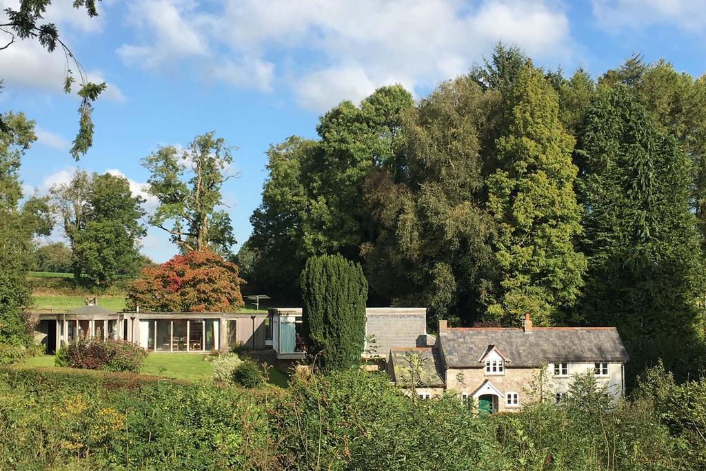 Chewton Mendip Somerset SOLD This incredible property set in the idyllic Somerset countryside is a historic stone cottage attached to a striking and substantial 1960s Modernist house.