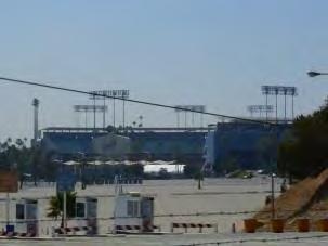 Name: Dodger Stadium Description: Dodger Stadium is located at 1000 Elysian Park Avenue, in the southwestern portion of Elysian Park, directly east of the 110 Freeway (Arroyo Seco Parkway).