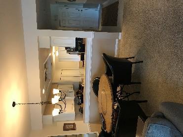Fully equipped eatin kitchen, separate dining area, large open living room. Washer/dryer in unit. Tile/hardwood throughout.