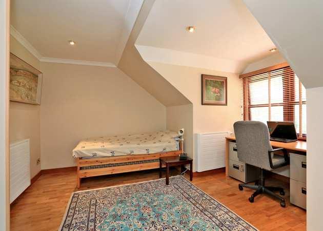 BEDROOM 6 14'6x13'4 (4.43m x 4.07m) A spacious double sized room with wood flooring and large window overlooking the gardens to the front. Part combed ceilings and recessed lighting.