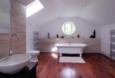 En-suite Bathroom Beautifully fitted with walk-in wet room style slate lined shower enclosure, freestanding claw foot bath, twin wash basins on cabinets and WC.