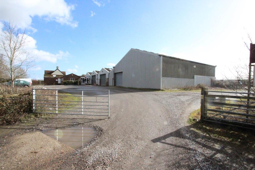 FREEHOLD FOR SALE FREEHOLD RANGE OF WAREHOUSE BUILDINGS AND STORES WITH FORMER OPEN STORAGE YARD ALL ON A SITE