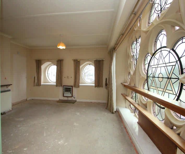 32m) max approx: a triple aspect room with fantastic west-facing stained-glass rose window to side, part of the original church; 2 south-facing porthole windows to rear,