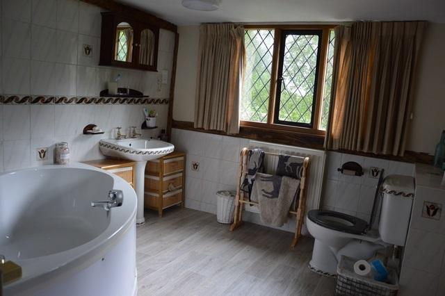 Bathroom Separate wc 2.214m (max) x 2.459m (max) Comprising bath, w.c. and wash hand basin together with an airing cupboard. Comprising w.c and wash hand basin. FIRST FLOOR Bedroom One Bathroom 4.