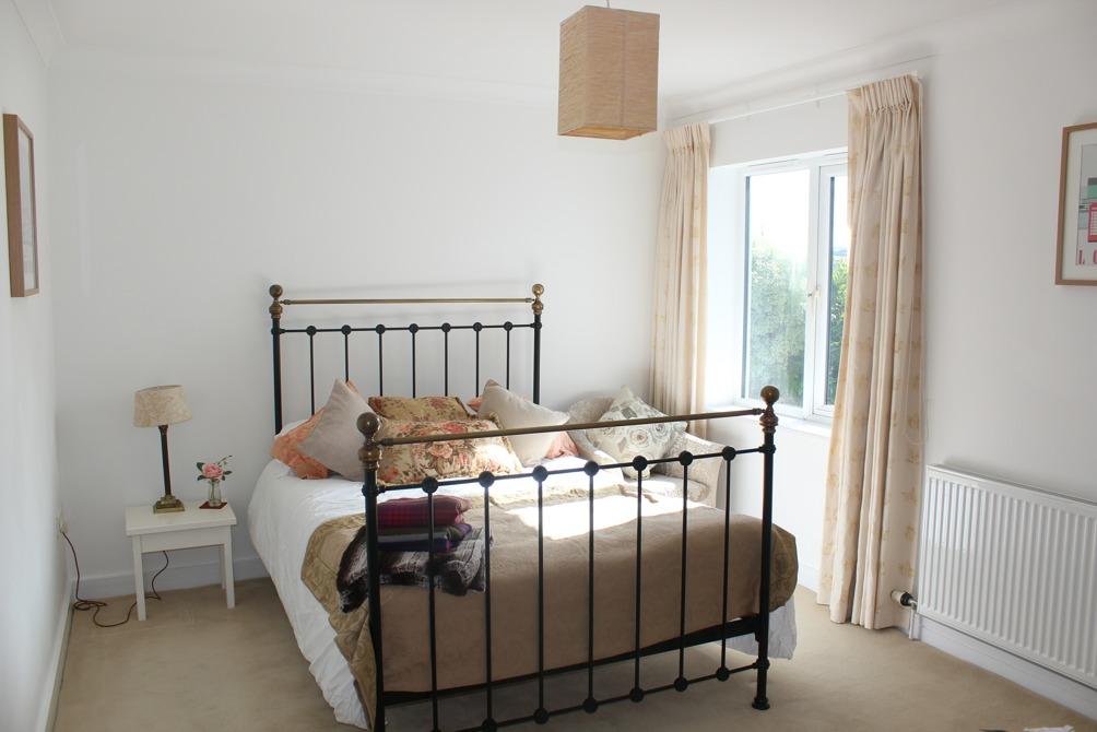 Master Bedroom, again with lovely views over the Estuary. Fitted with T.V, telephone points and radiator. En-suite Shower Room, with a large shower enclosure and a thermostatic shower unit.