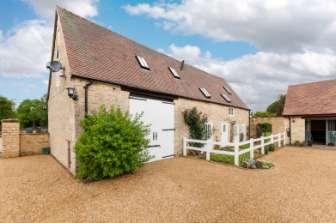 BUSHY LAWN BARN A Grade II listed self contained 3 bedroom barn conversion retaining many original features and offering accommodation arranged over two floors which benefits from Lpg gas fired
