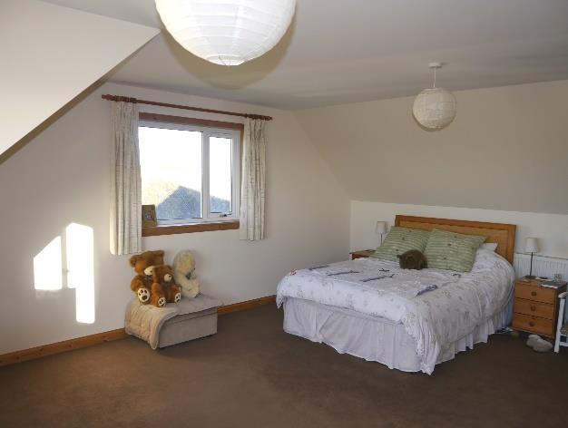 Bedroom 3: Carpet, sky point, access to eaves, radiator, 2 windows (one large