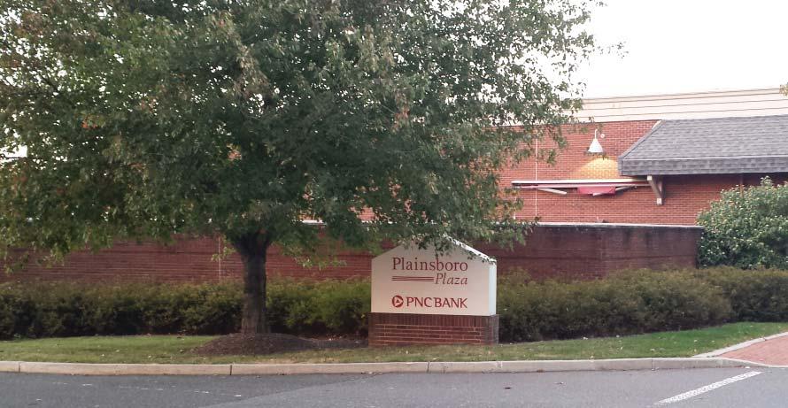 existing free-standing signs shared with PNC Bank near the rear of