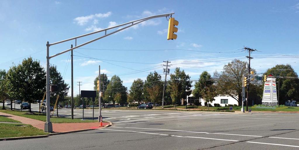 Proposed A directory sign is proposed for the corner of Scudders Mill and Schalks Crossing Roads; Plainsboro Plaza presently has no visible identity.