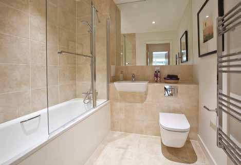 Bathroom Our bathrooms are fitted with a heated chrome towel warmer, mirror wall vanity unit and Ivory wall and floor tiles. Each of our bathrooms have been fitted with a bath and overhead shower.