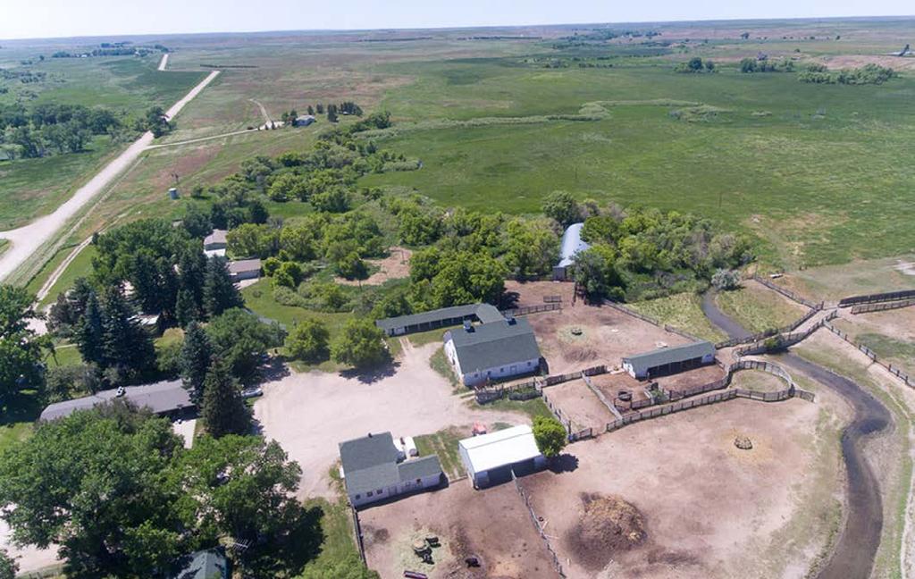 IMPROVEMENTS The Y-6 Ranch is rich with improvements. There is a total of 10 homes and a plethora of outbuildings and corrals along with a 900-head capacity feedlot, and 6,000-head feedlot.