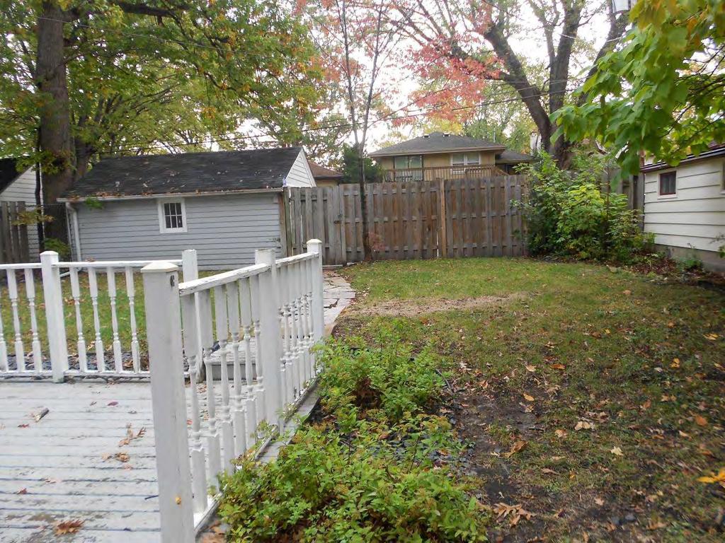 The backyard is clean and presentable with no trash or debris.