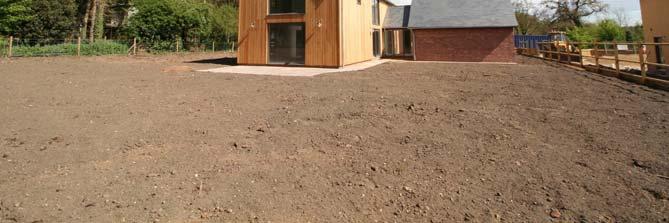 The drive is flanked by gardens which will be left to topsoil, with a paved walkway leading up to the covered porch and Entrance Hall.