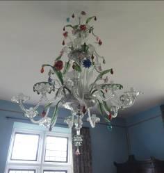 Non-functional, antique, Venetian coloured glass chandelier.