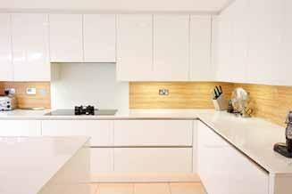 Specification Kitchens German contemporary units by Häcker with integrated Neff appliances comprising: fridge/freezer,