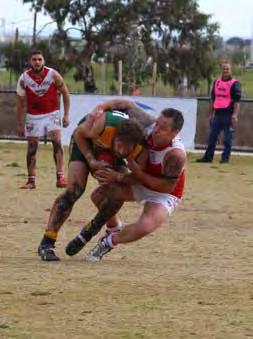 ROUND WRAP DIVISION TWO RESERVES The atmosphere down at Wyndham Vale South Oval was full of anxious and excited spectators as the two undefeated teams, the Roosters and the Falcons, prepared to